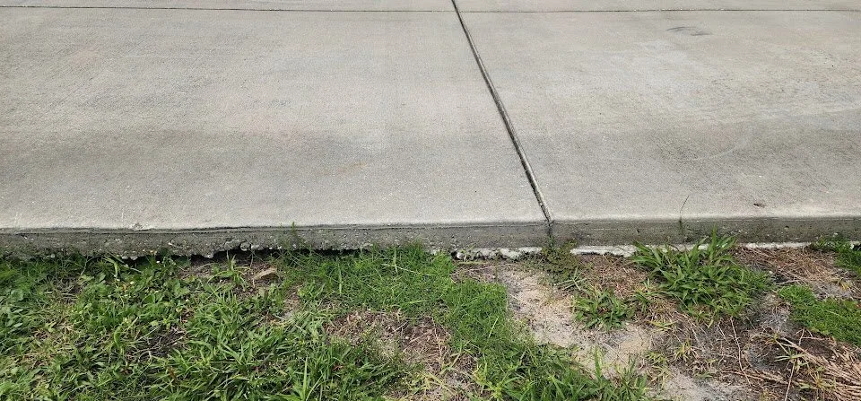 Soil void beneath concrete slab edge in Homosassa FL