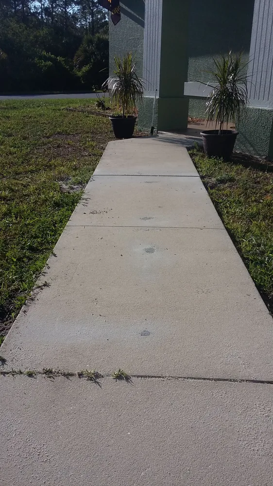 Level concrete sidewalk after foam lifting repair