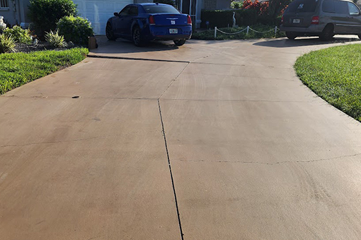 Uneven Driveway in Tampa Bay Florida That Needs Driveway Repair Services